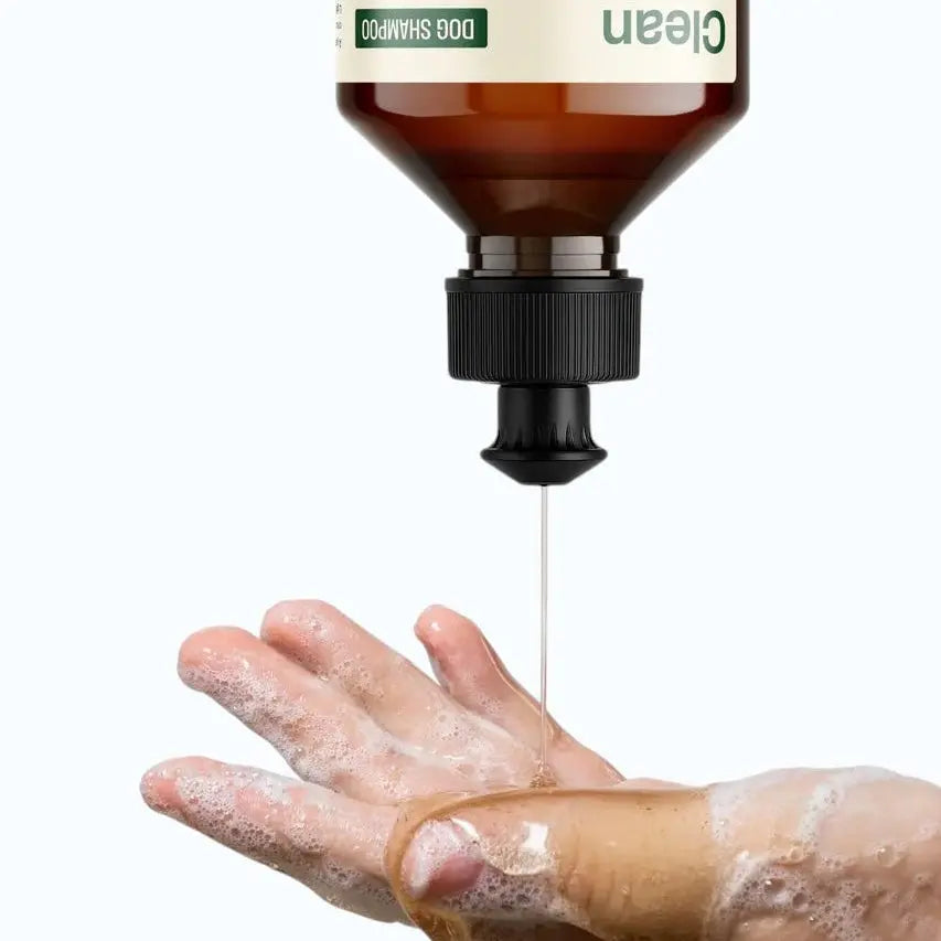 Doganics Cleanse & Comfort Duo – shampoo being poured into hand for application, product in use