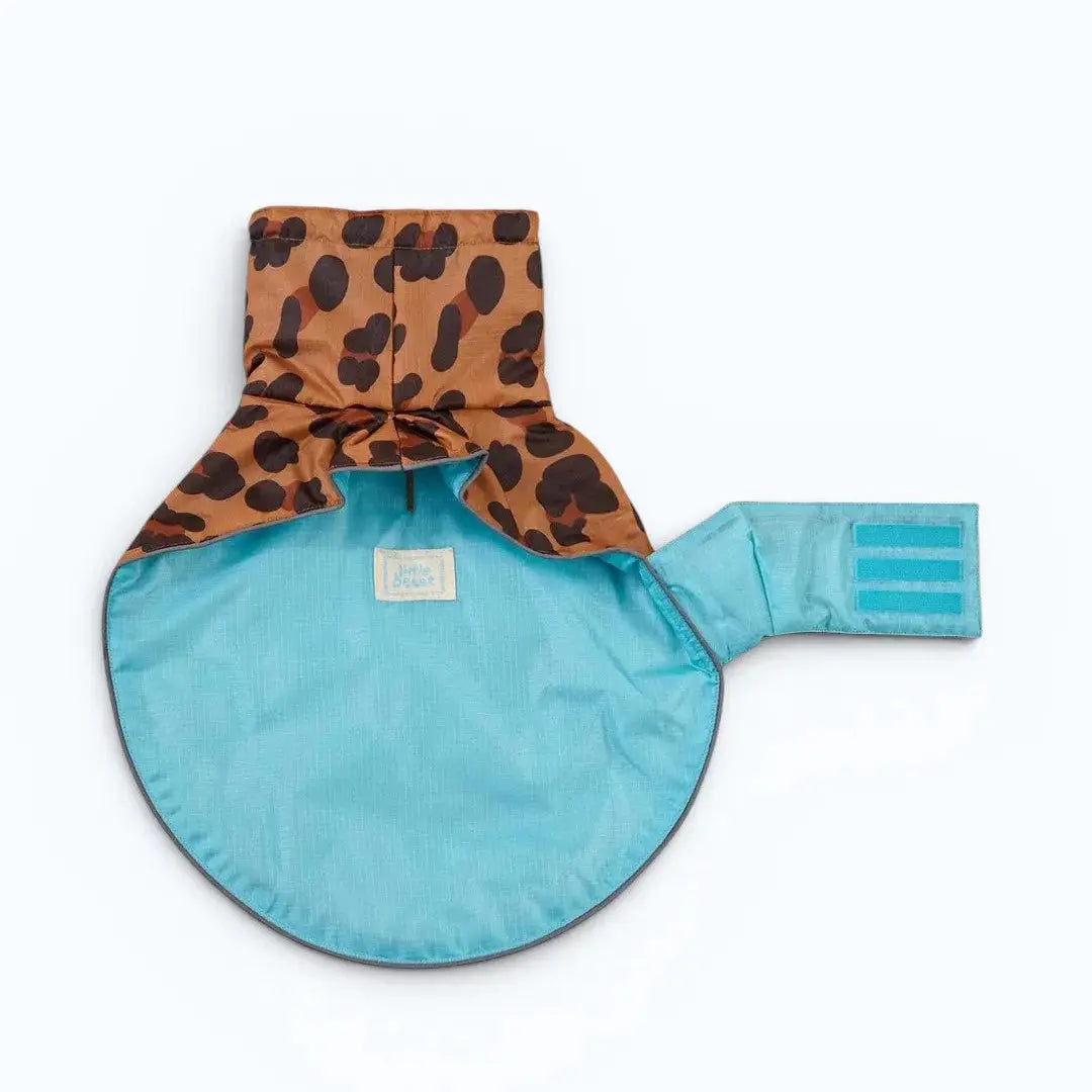 Little Beast Cougar Dog Rain Coat – Made from 100% nylon shell with a padded lining, offering warmth and water resistance for urban dog adventures