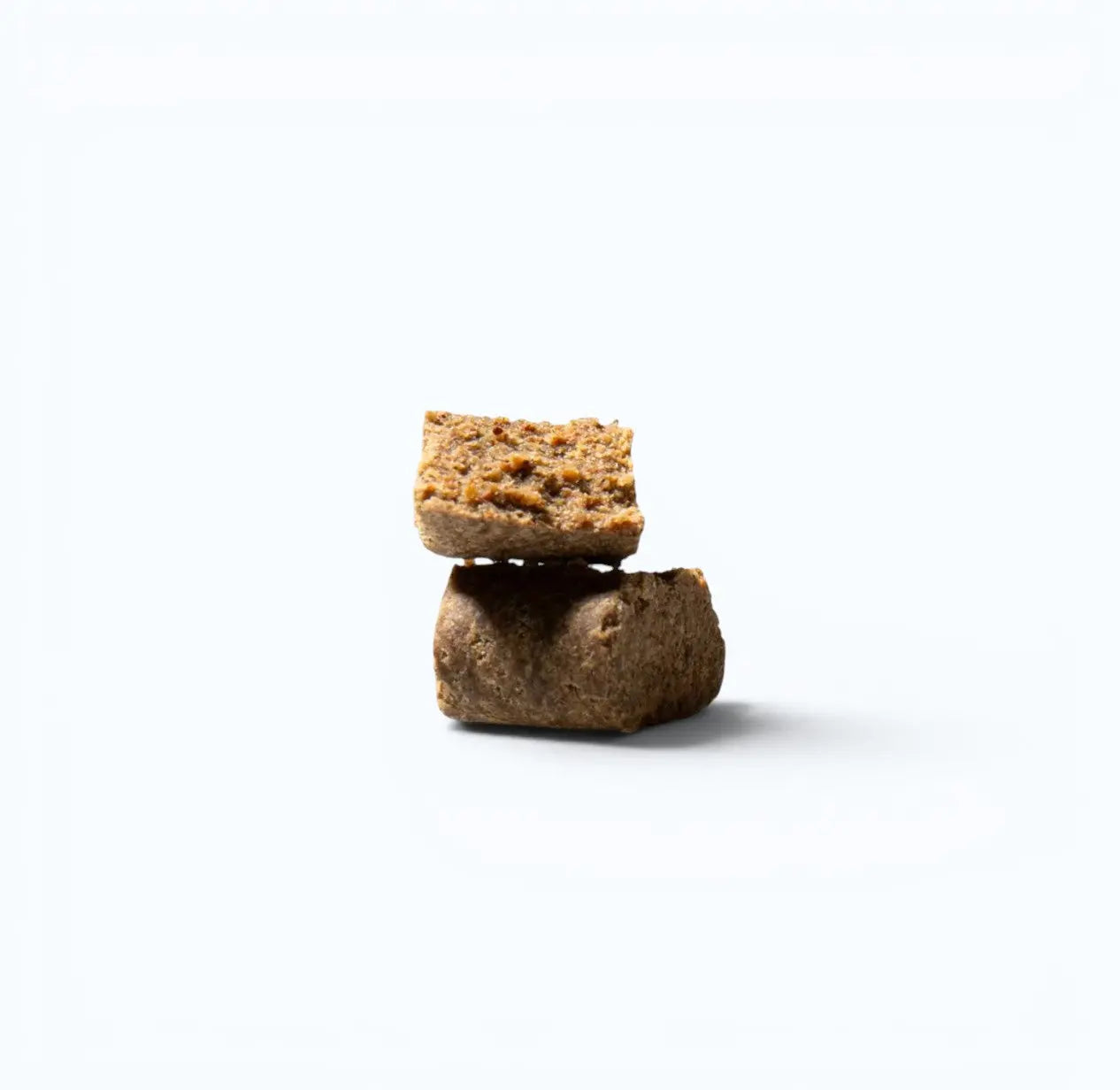 Doganics Mood Calm & Relax Supplement – close-up of two stacked beef liver flavored soft chews
