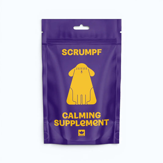 Purple packaging of SCRUMPF calming supplement with a yellow dog illustration on a white background