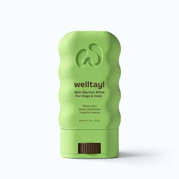 Welltayl Skin Barrier Stick – green twist-up balm stick for dogs and cats on white background, product shot