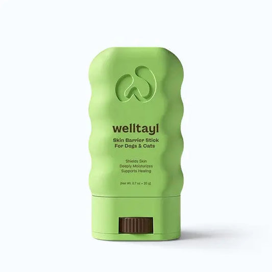 Welltayl Skin Barrier Stick – green twist-up balm stick for dogs and cats on white background, product shot