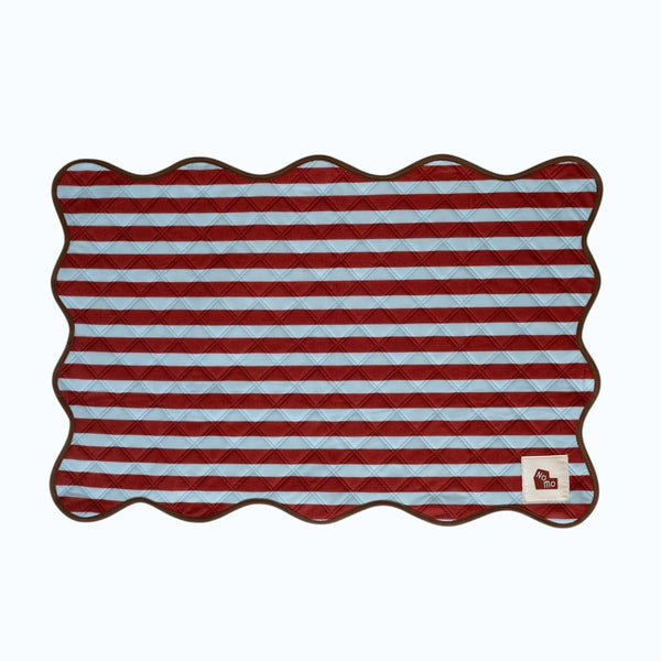 The Ellie Pad reusable washable dog pee pad by NomoHaus with red and white striped scalloped design on white background
